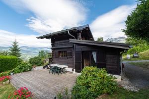 Maisons de vacances Chalet du Brey - Avec terrasse et jardin : photos des chambres