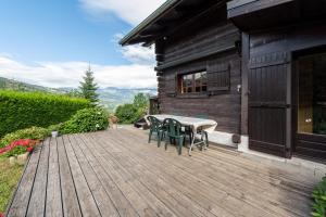 Maisons de vacances Chalet du Brey - Avec terrasse et jardin : photos des chambres