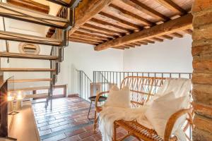 AffittiBreviSiena - Palazzo Monaci Appartamento con piscina nelle crete Senesi