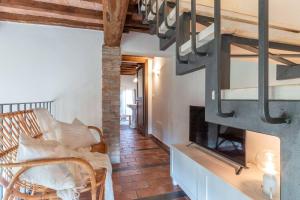 AffittiBreviSiena - Palazzo Monaci Appartamento con piscina nelle crete Senesi