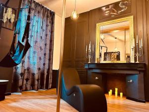 Appartements Love room « L'etreinte doree » : photos des chambres