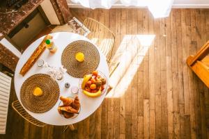 Appartements Cosy calme RER D - 10 min Parking gratuit sur place : photos des chambres