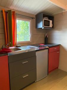 Maisons d'hotes Tiny House au coeur des Combes : photos des chambres