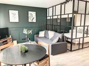 Appartements Le Jules - Ambiance anglaise : photos des chambres