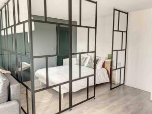 Appartements Le Jules - Ambiance anglaise : photos des chambres