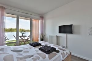 Appartements Le Tyrossais - Terrasses - Parking : photos des chambres