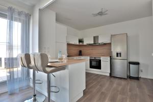 Appartements Le Tyrossais - Terrasses - Parking : photos des chambres