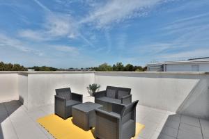 Appartements Le Tyrossais - Terrasses - Parking : photos des chambres