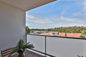 Appartements Le Tyrossais - Terrasses - Parking : photos des chambres