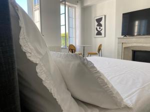 B&B / Chambres d'hotes Maison d’hotes Le 1853 : photos des chambres