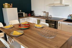 Maisons de vacances Appartement neuf dans maison : photos des chambres