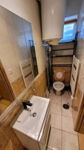 Appartements Logements A 2 PETITS PAS : photos des chambres