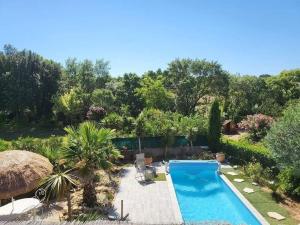 Appartements Superbe appartement au calme avec piscine : photos des chambres