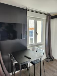 Appartements Le Jean Jaures 2 - Joli studio avec stationnement : photos des chambres