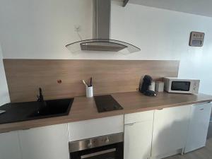 Appartements Appartement proche centre ville : photos des chambres
