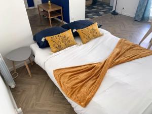 Appartements MIMOSA- 5 min gare- arrivee autonome- Parking & wifi Gratuit : photos des chambres