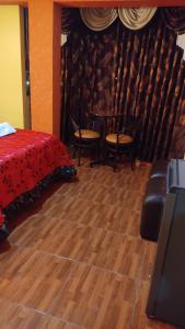 HOTEL LA BELLA Y EL LEON