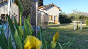 Altos del Pucara Piscina Climatizada vista a las sierras juegos Huerta Orgánica