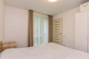 Erdvūs apartamentai Vanagupėje