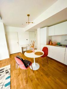 Appartements Studio 10min Paris 30min Disneyland : photos des chambres