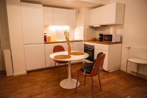 Appartements Studio 10min Paris 30min Disneyland : photos des chambres