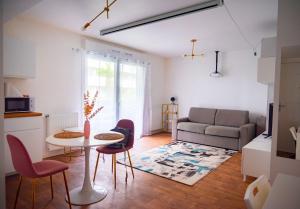 Appartements Studio 10min Paris 30min Disneyland : photos des chambres