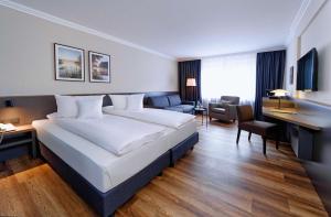 Deluxe room / Double Bed and Sofa Bed room in Hotel Landgut Horn