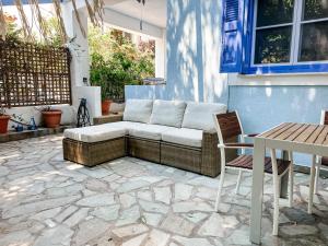 Blue Seaside House with Garden