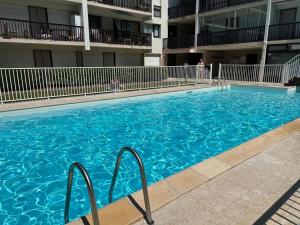 LE COSY avec piscine, balcon et parking