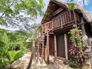 Uh Najil Dzul. Cabaña: Casa del extranjero - Chichimilá