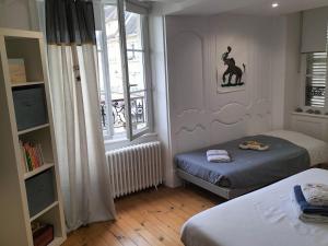 Sejours chez l'habitant La maison des remparts : photos des chambres