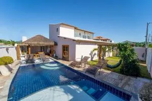 Casa com piscina 4 suites Bosque de Geriba - Manguinhos