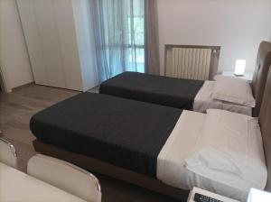 Camere Scandellara 24
