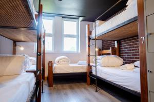 Bed in 7-Bed Mixed Dormitory Room  room in The Nest Boutique Hostel