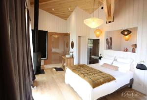 Maisons de vacances les Hauts de Rebeillou - Cabane Spa : photos des chambres