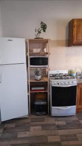 Casa parrilla patio estacionamiento