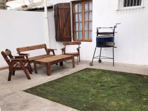 Casa parrilla patio estacionamiento