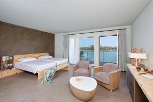 Junior Suite with Balcony and Lagoon View room in Boutique Hotel Oche Selvatiche