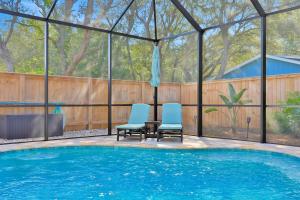 Renovated home with private pool, patio, outdoor fireplace, & grill