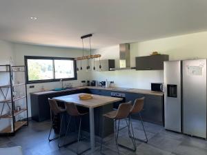 Maisons de vacances Maison cosy 130m2 : photos des chambres