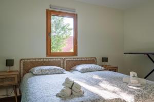 Maisons de vacances Le Grand Nichoir de la Colline - Parking - Wifi : photos des chambres