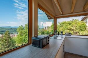 Le Grand Nichoir de la Colline - Parking - Wifi