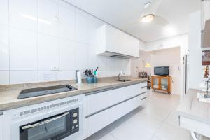 Enseada - A 5 min da praia com Wi-fi e TV