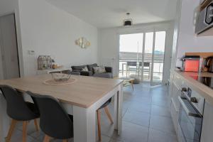 Appartements Le Nid des Romains - T2 neuf - Balcon - vue : photos des chambres