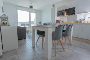 Appartements Le Nid des Romains - T2 neuf - Balcon - vue : photos des chambres