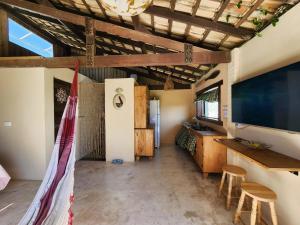 Loft romântico pé na areia
