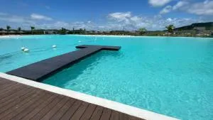 Bluu Habitat Lagoon Condos - Los Cerritos