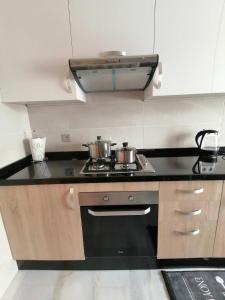 Appart neuf 85m au centre, wifi + clim + parking