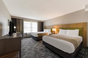 Queen Room with Two Queen Beds - Non-Smoking room in Country Inn & Suites by Radisson Wichita East KS