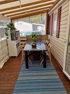 Maisons de vacances Bungalow de 3 chambres avec piscine partagee et terrasse a Vias a 1 km de la plage : photos des chambres